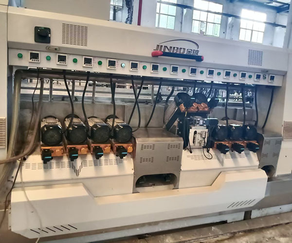 Bilateral edge grinding machine